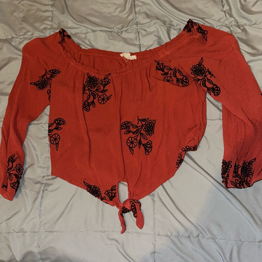 Orange and black off the shoulder blouse with tie front